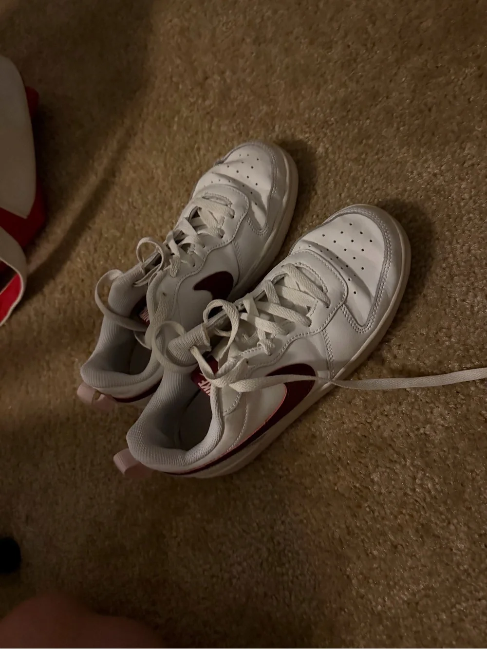Nike Kids White Sneakers with Maroon Swoosh and Pink Accents